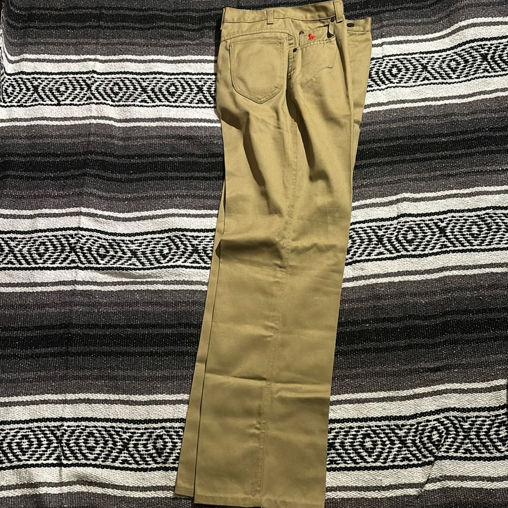 dark tan polo / khaki pants